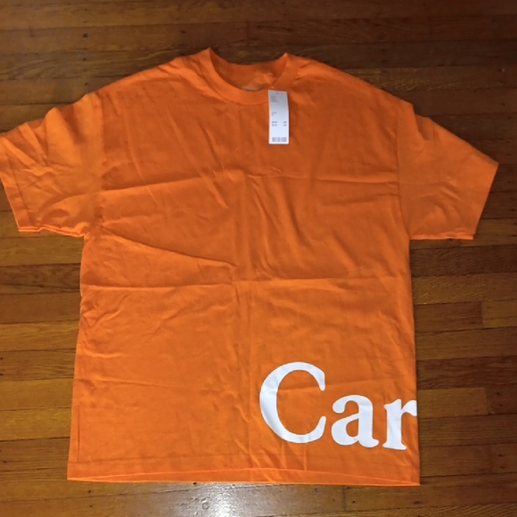 Urban Outfitters Other - Urban Outfitters Orange Short-Sleeve Tee with White Graphic